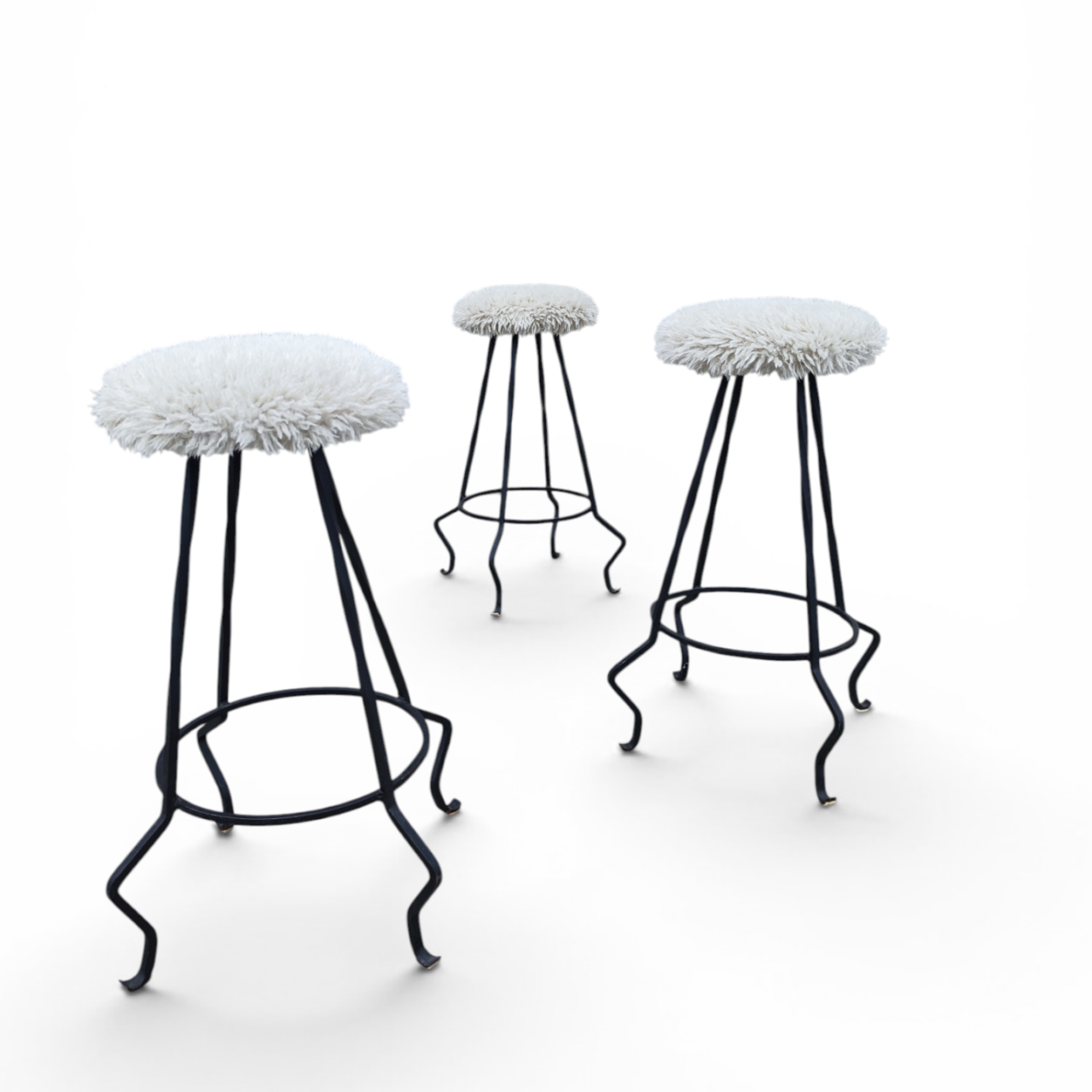 Trio of steel and wool barstools